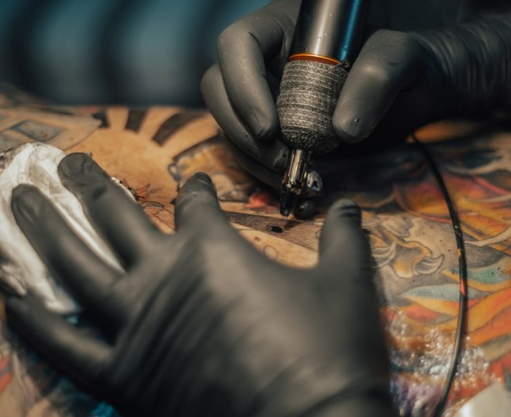 Close up of the tattoo machine. Tattooing.